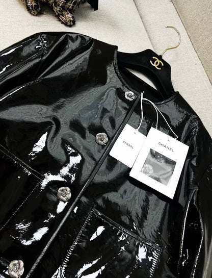 Chanel 23k black patent leather jacket
