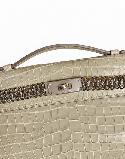 Hermes Kelly cut Unchained Beton Matte Porosus White Gold hardware