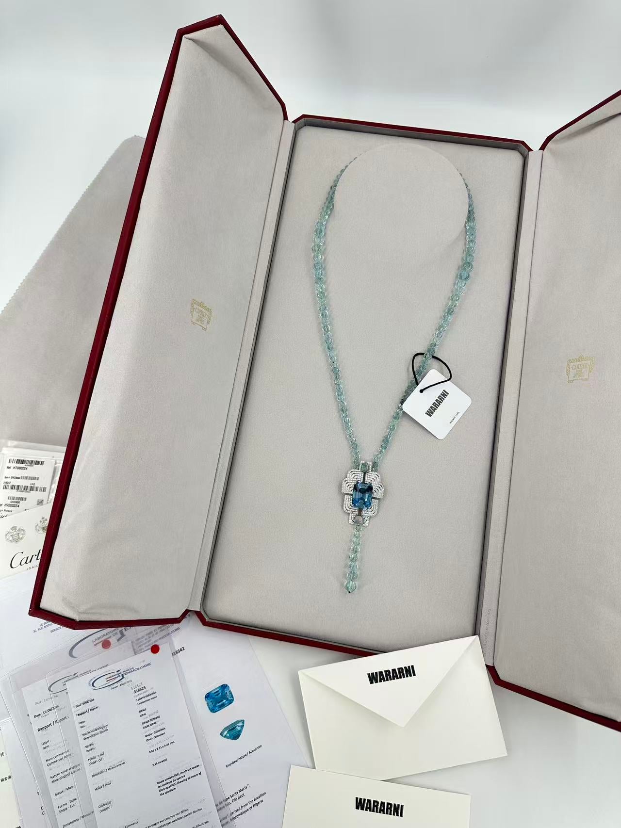 Cartier High Jewelry Necklace - Main stone: 37-carat aquamarine; two opals; chain beads: topaz.