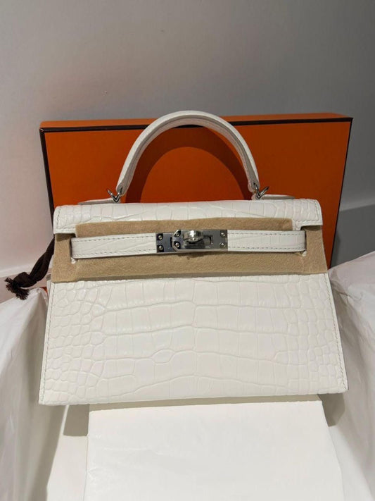 Hermès Mini Kelly 20 Creme Chantilly Matte Porosus Palladium hardware