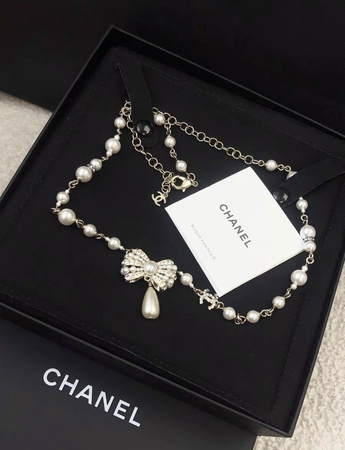 Chanel 20SS Bow Necklace in Stainless Steel with Faux Pearl and Rhinestone