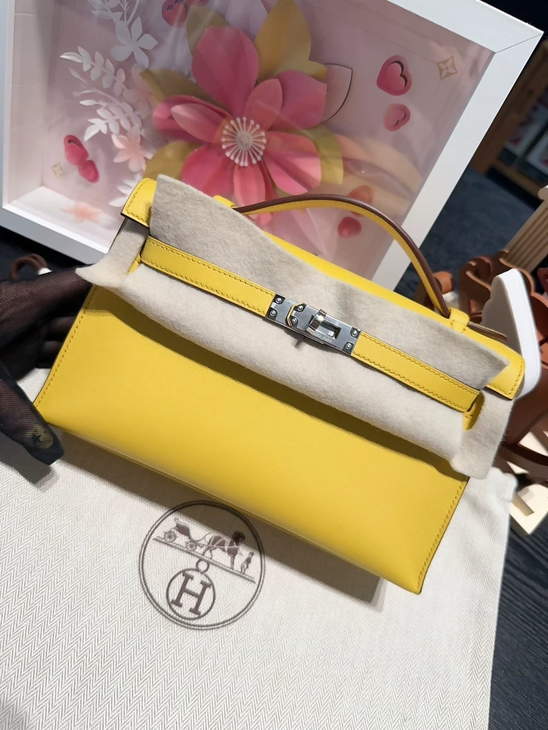 Hermes Kelly Pochette yellow swift leather palladium hardware
