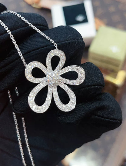 Van Cleef 
Arpels White Gold and Diamond Flowerlace Pendant Necklace