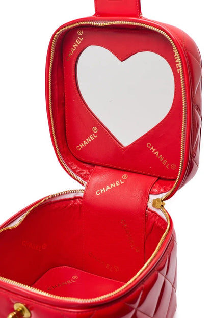 CHANEL 1995 VINTAGE "BARBIE" RED PATENT HEART-MIRROR VANITY CASE BAG