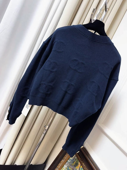 Chanel 21P dark blue with red embossed double C cardigan