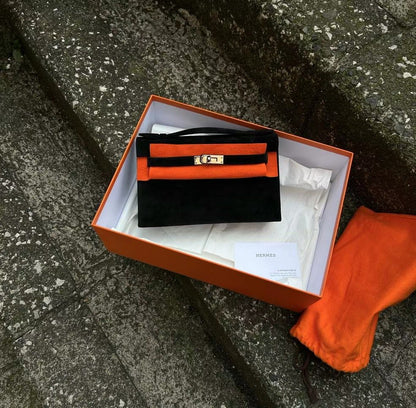 Rare HERMÈS KELLY DOBLIS MINI POCHETTE BLACK VEAU SUEDE