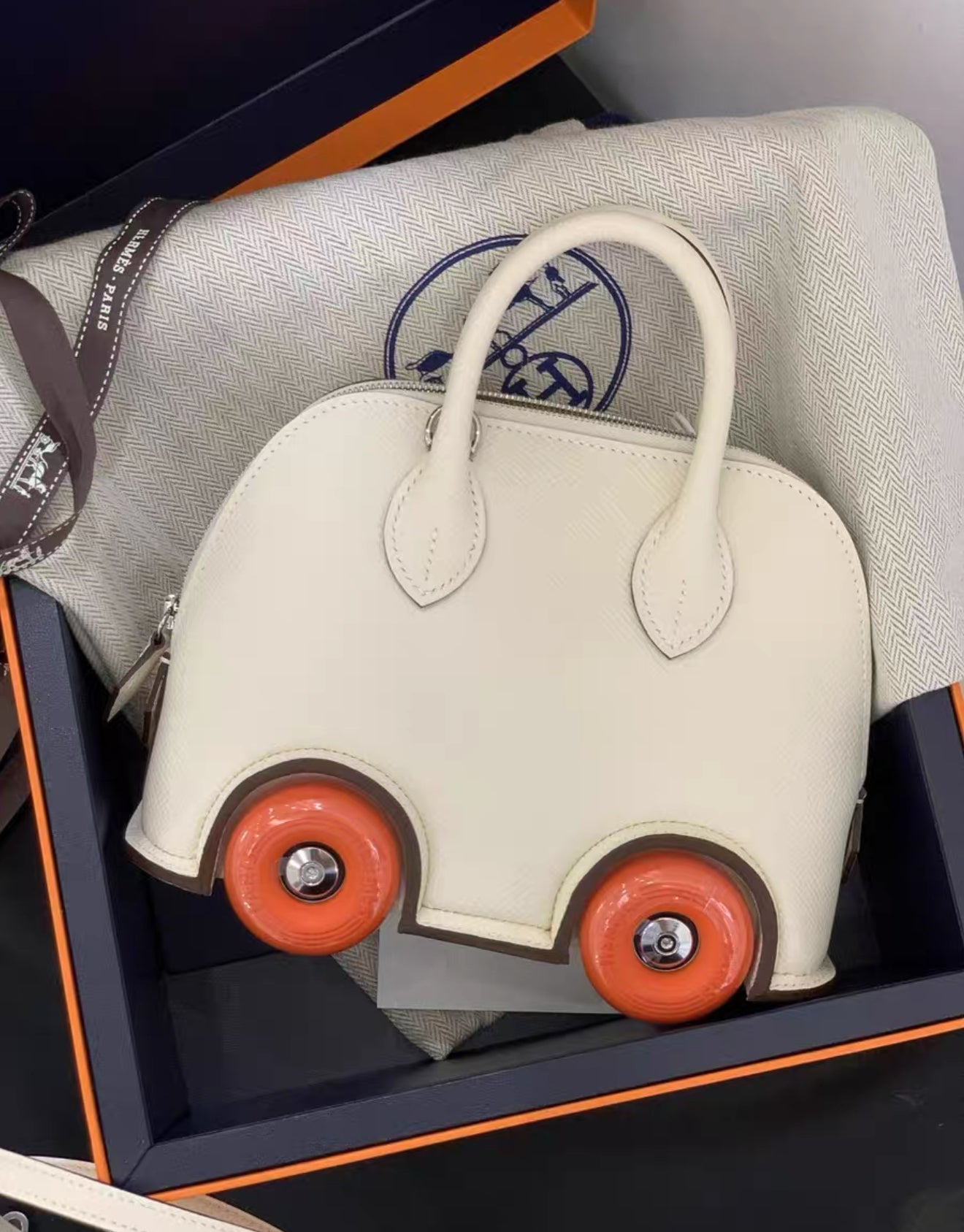 Hermès Bolide on Wheel Nata/Orange Epsom Leather Palladium Hardware