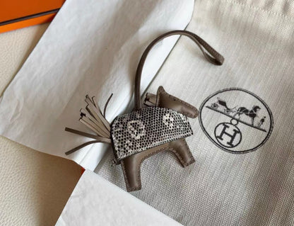 Hermes Rodeo Rock cape lizard and Etoupe leather charm