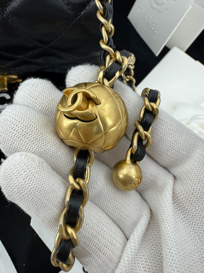 Chanel black mini flap bag with gold hardware