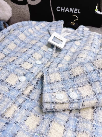 Chanel 22B blue and white sequined check tweed jacket