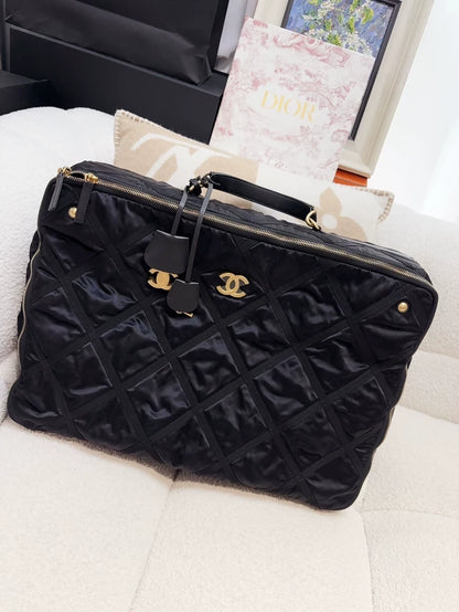 Chanel 22P travel box in black quilted nylon