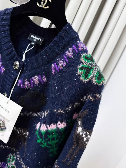 Chanel 25n Coco Neige Ski Collection navy blue knit cardigan