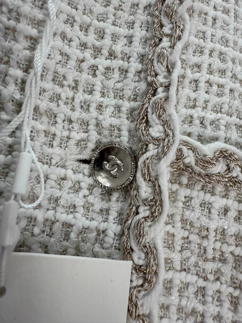 Chanel 25s white tweed jack yet