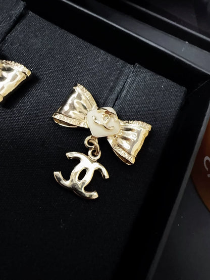 Chanel 22S bow double C earrings