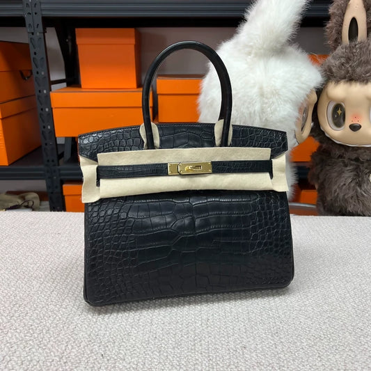 Hermes Birkin 30 black and gold matte crocodile leather gold hardware