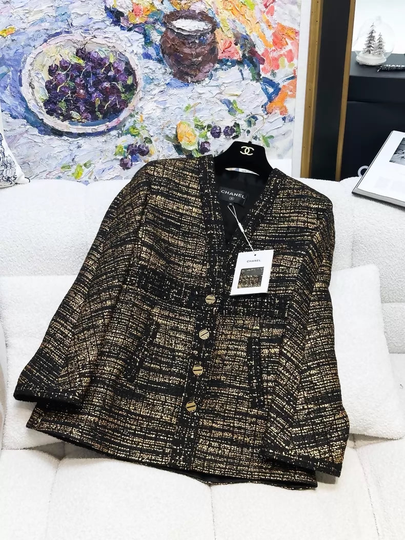 Chanel 19A black and gold tweed jacket