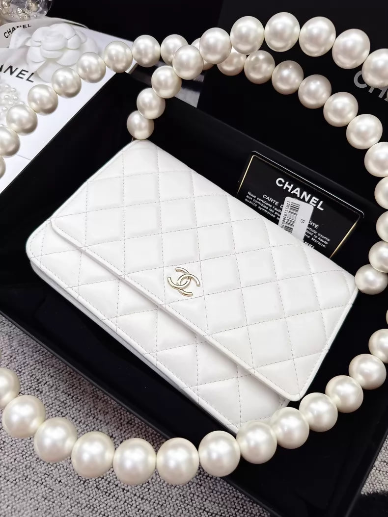 Chanel 20k ecru gold pearl chain WOC shoulder bag