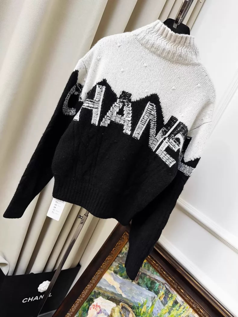 Chanel Coco Neige Ski Collection Black and White Knit Sweater with Coco Logo