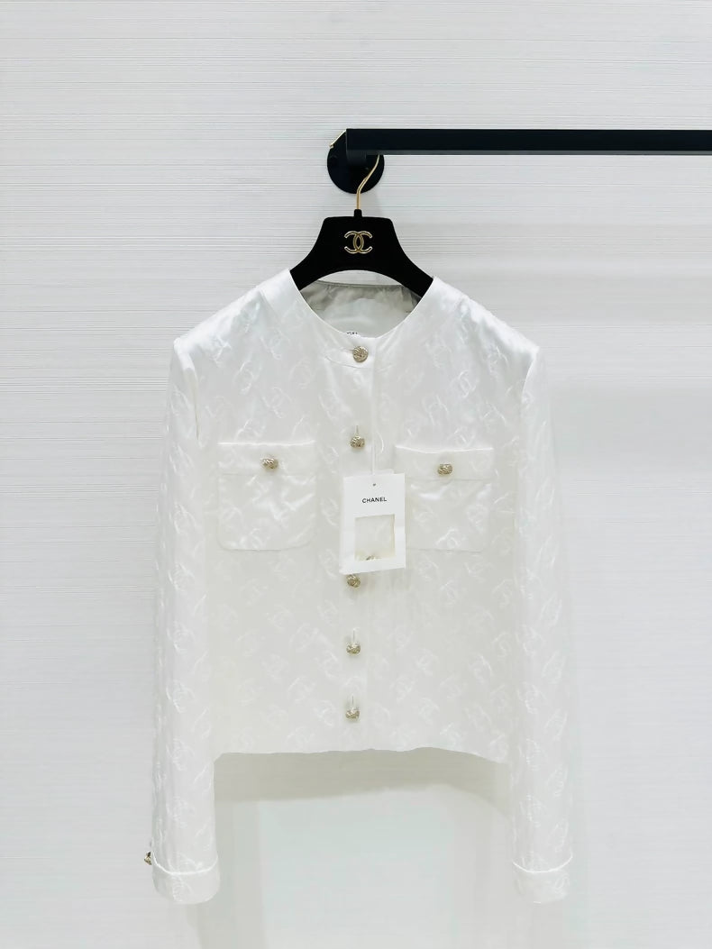 Chanel 25a ecru cardigan