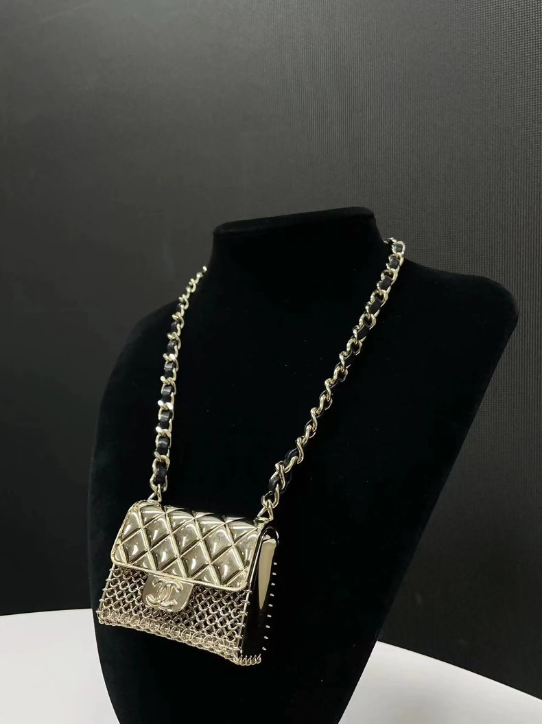 Chanel Spring/Summer 2021 mini bag necklace in leather and metal chain