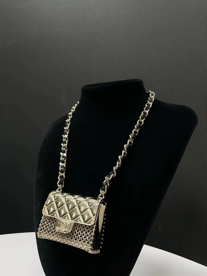 Chanel Spring/Summer 2021 mini bag necklace in leather and metal chain