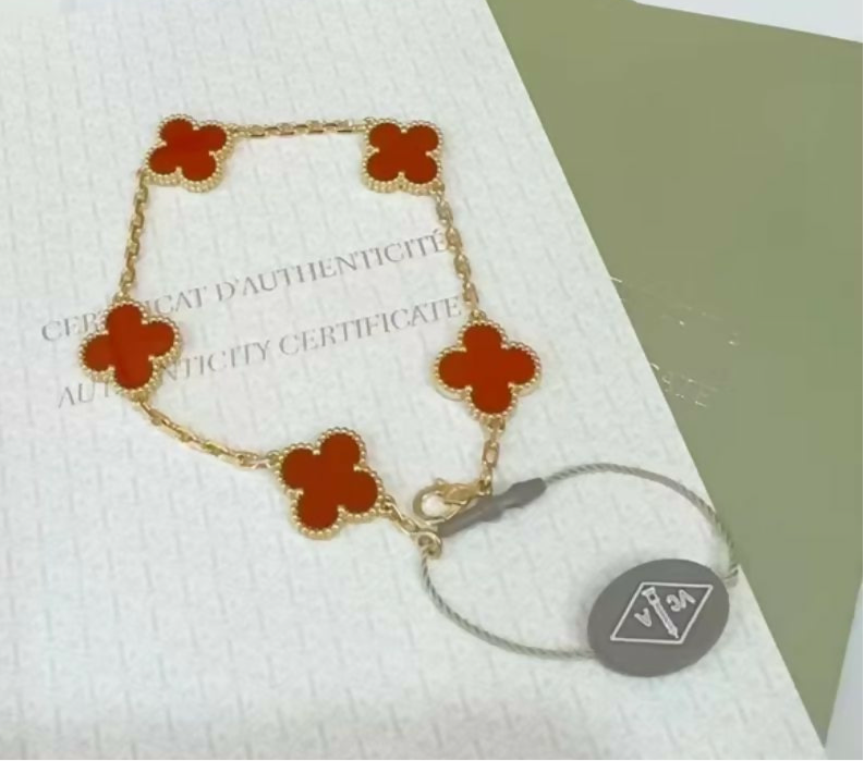 Van Cleef 
Arpels Vintage Alhambra Bracelet – 18K Gold with Red Carnelian
