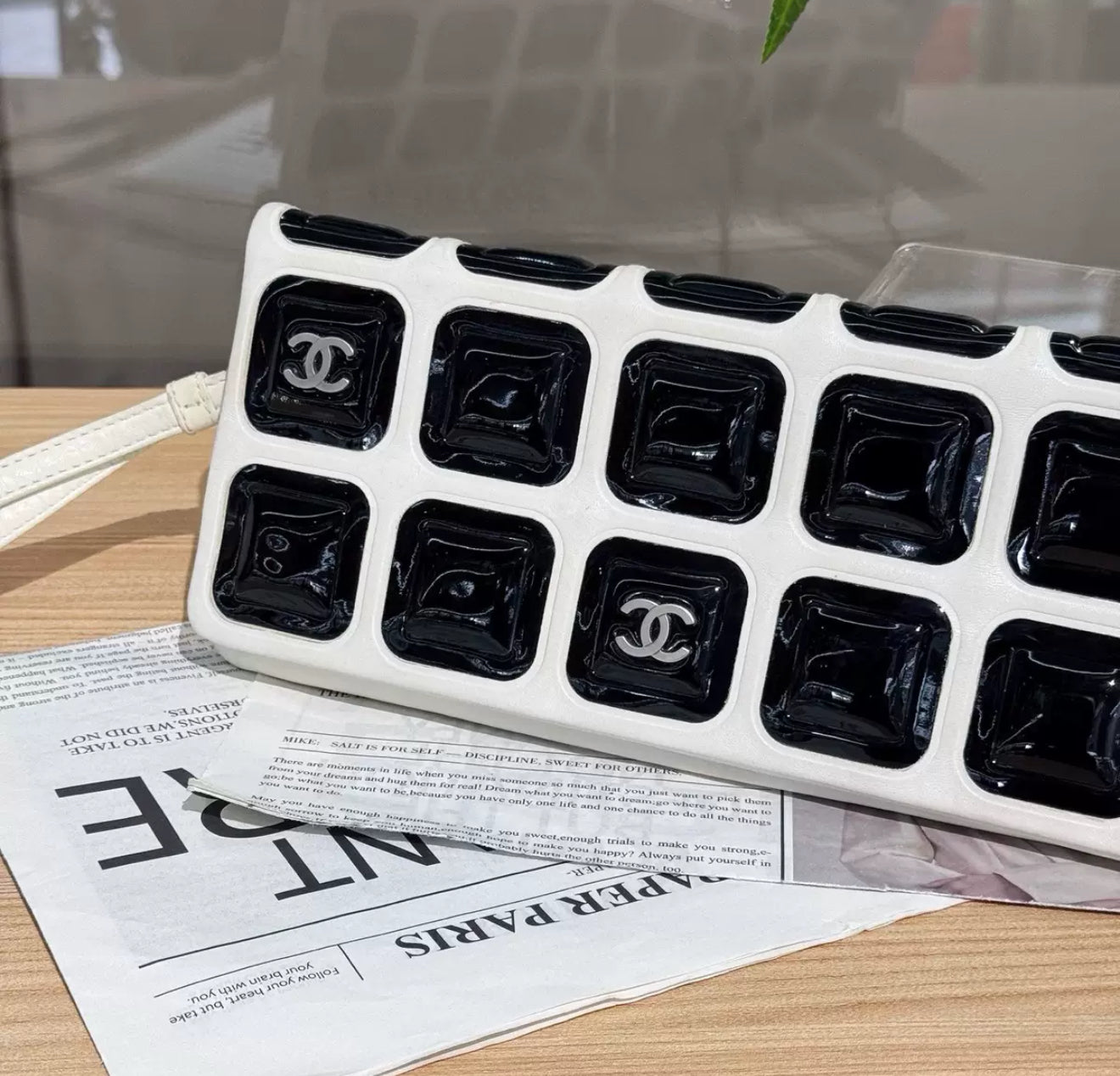 Chanel black and white patent leather clutch bag