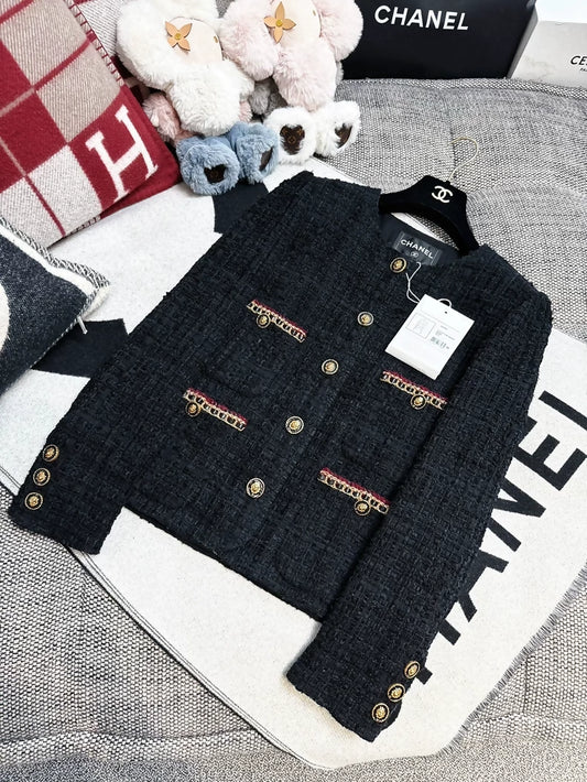 Chanel 21A black, four-pocket, in tweed with gold leather chain trim jacket