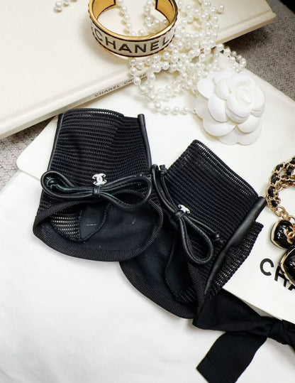 Chanel black mesh leather bow gloves