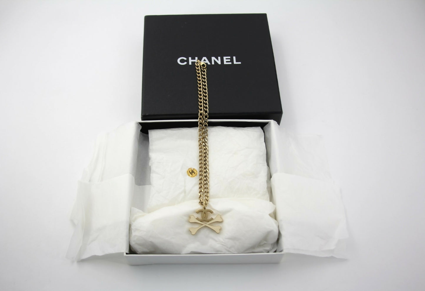 Chanel Vintage 03P Gold-plated CC Enamel White Skull Necklace