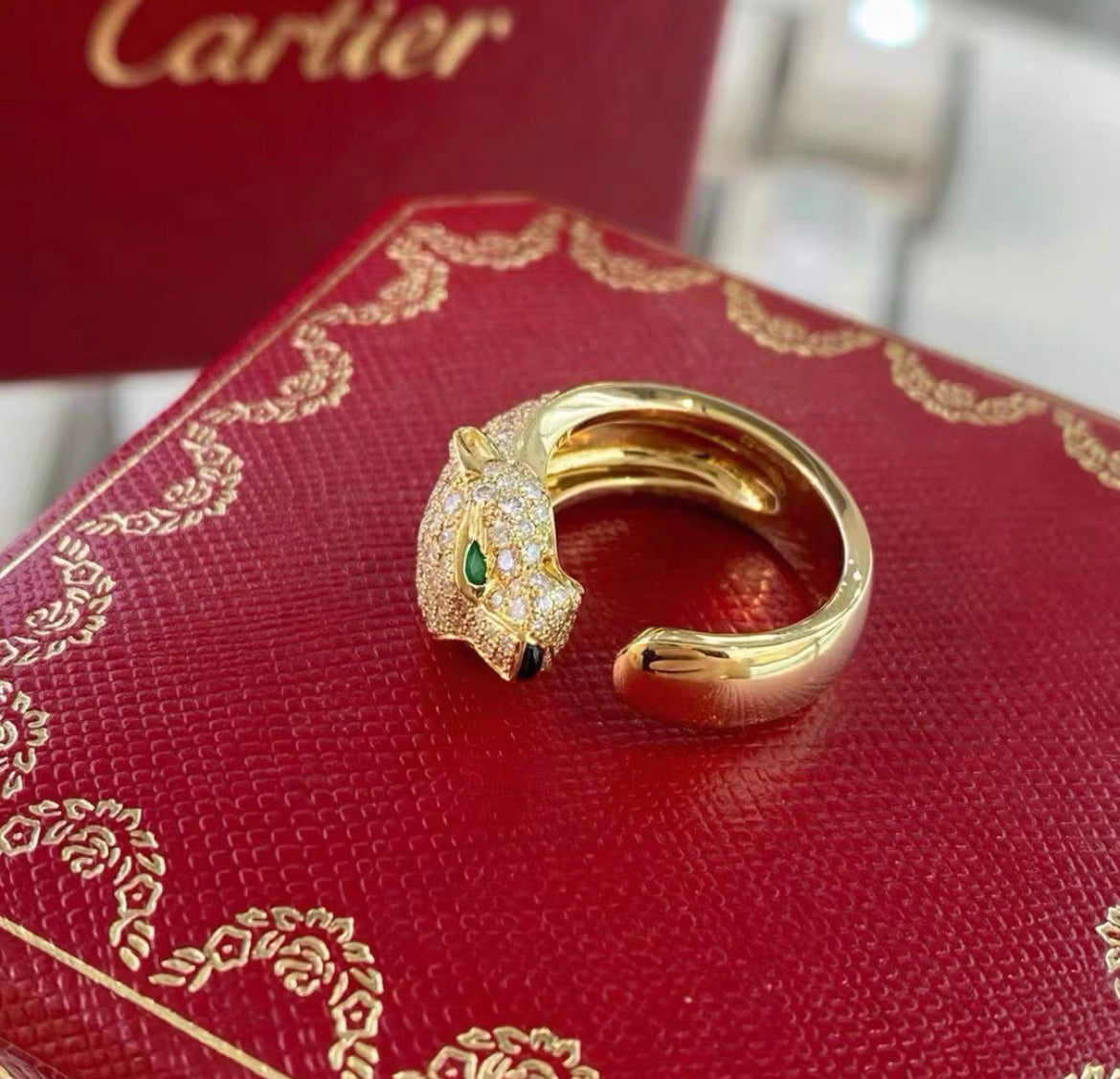 Panthere de Cartier ring in 18k Gold with diamonds and Emerald eyes Size 52