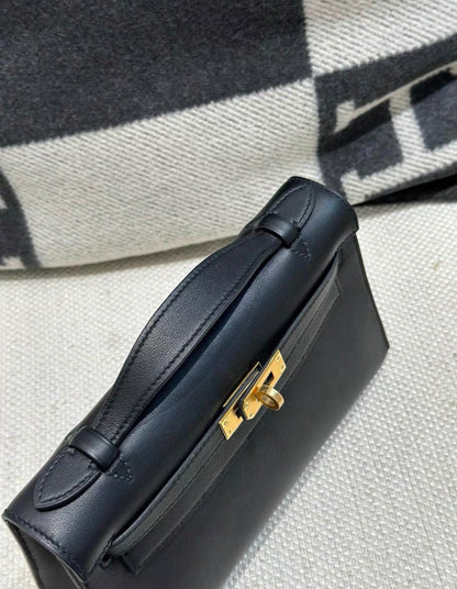 Hermès Kelly Pochette Black Swift Gold Hardware