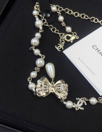 Chanel 20SS Bow Necklace in Stainless Steel with Faux Pearl and Rhinestone