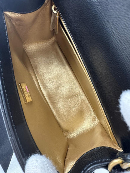 Chanel black mini flap bag with gold hardware