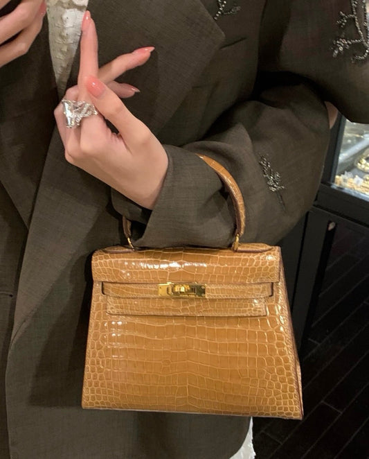 Rare Hermès vintage mini Kelly shiny crocodile leather gold hardware