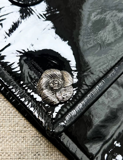Chanel 23k black patent leather jacket