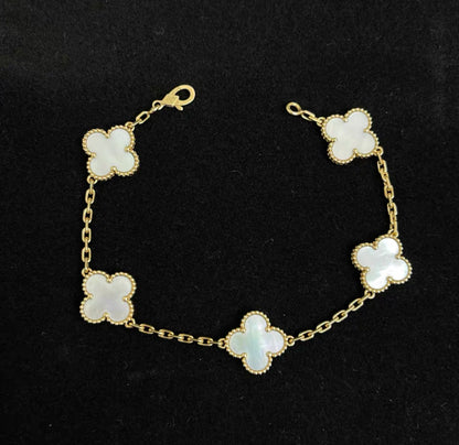 Vintage Alhambra bracelet, 5 motifs
18K yellow gold, Mother-of-pearl