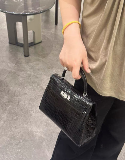 Hermes Kelly 25 Shiny crocodile leather white gold & diamond hardware