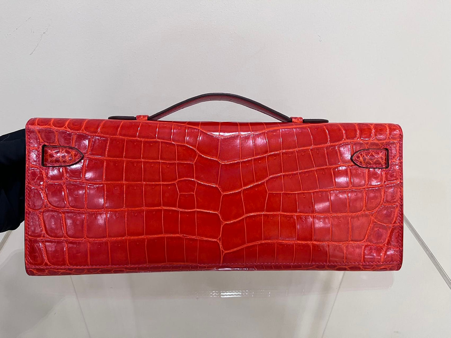 Hermes Kelly cut red shiny crocodile leather gold hardware