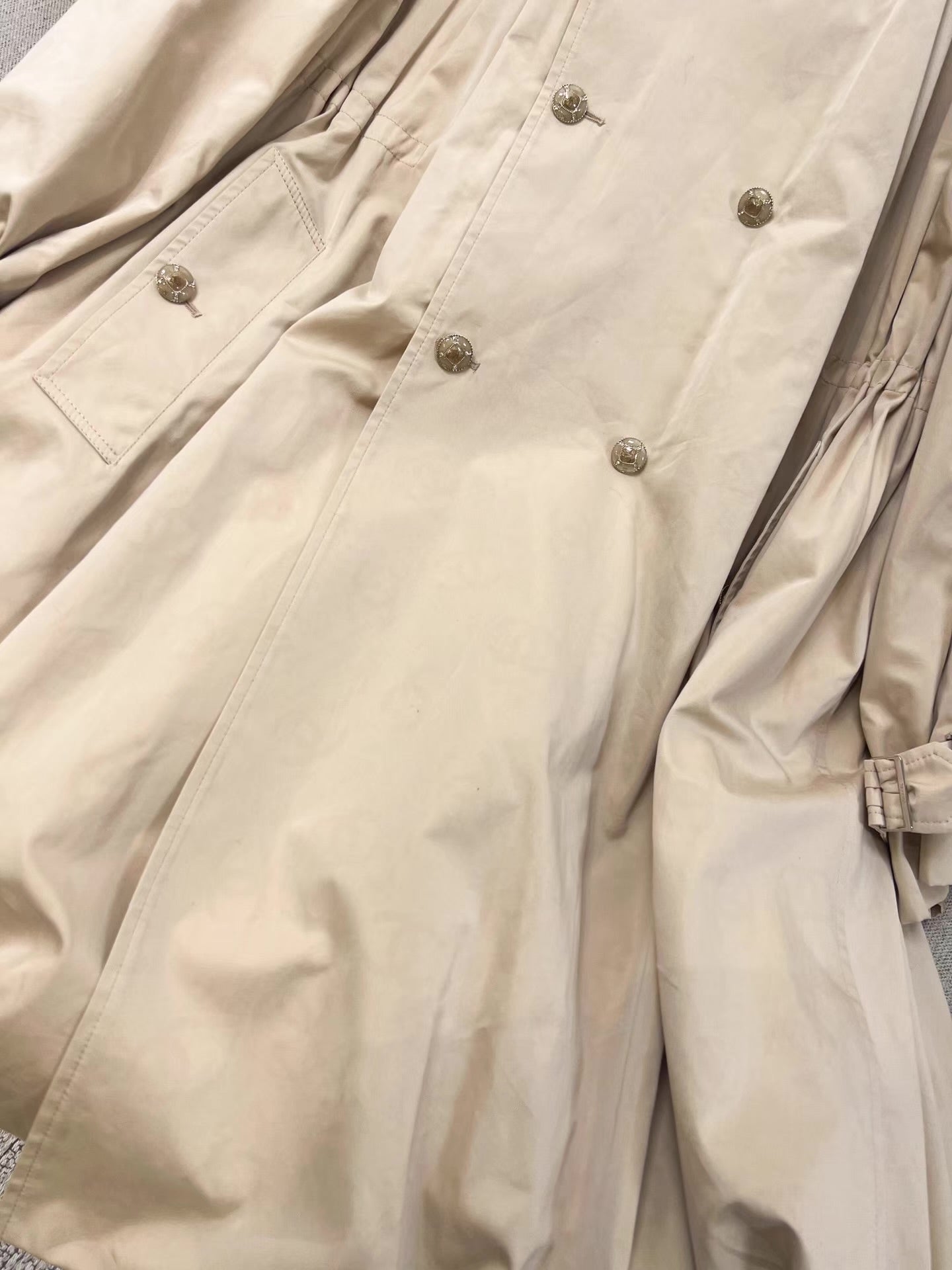 Chanel 25B trench coat with CC logo print