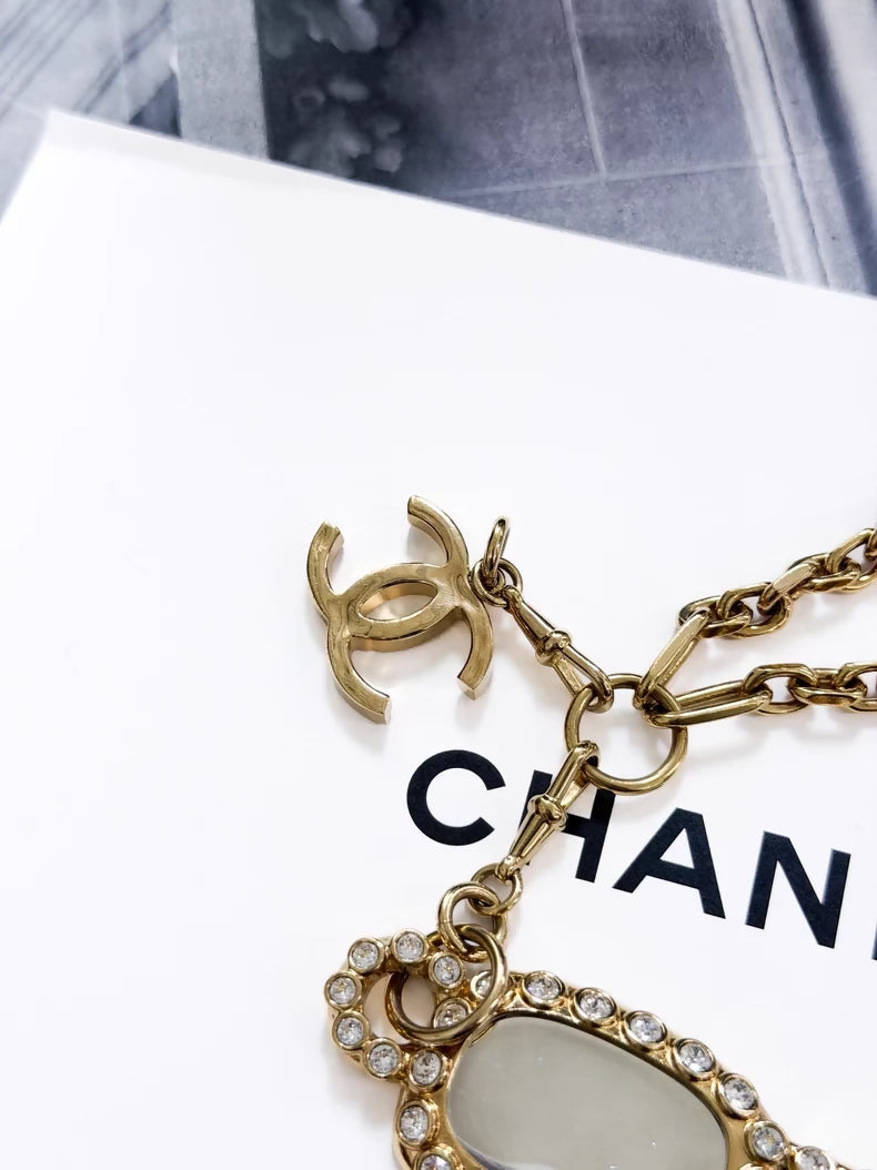 Chanel 24s gold-plated sunglasses-style long chain necklace