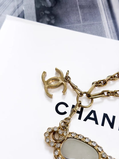 Chanel 24s gold-plated sunglasses-style long chain necklace