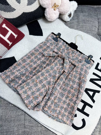 Chanel 22K pink gray tweed bow shorts