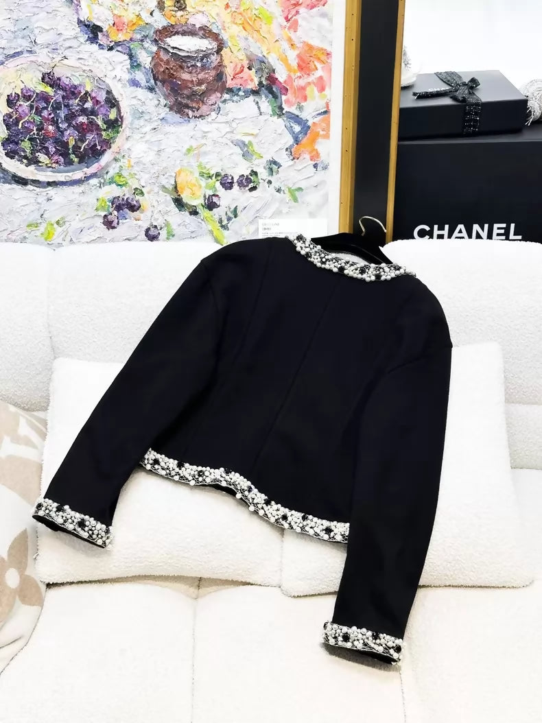 Chanel 20A haute couture black tweed jacket