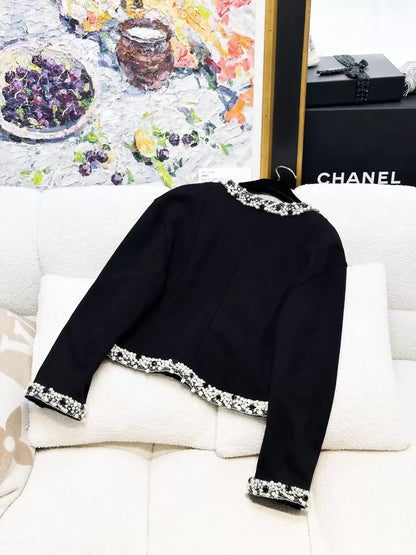Chanel 20A haute couture black tweed jacket