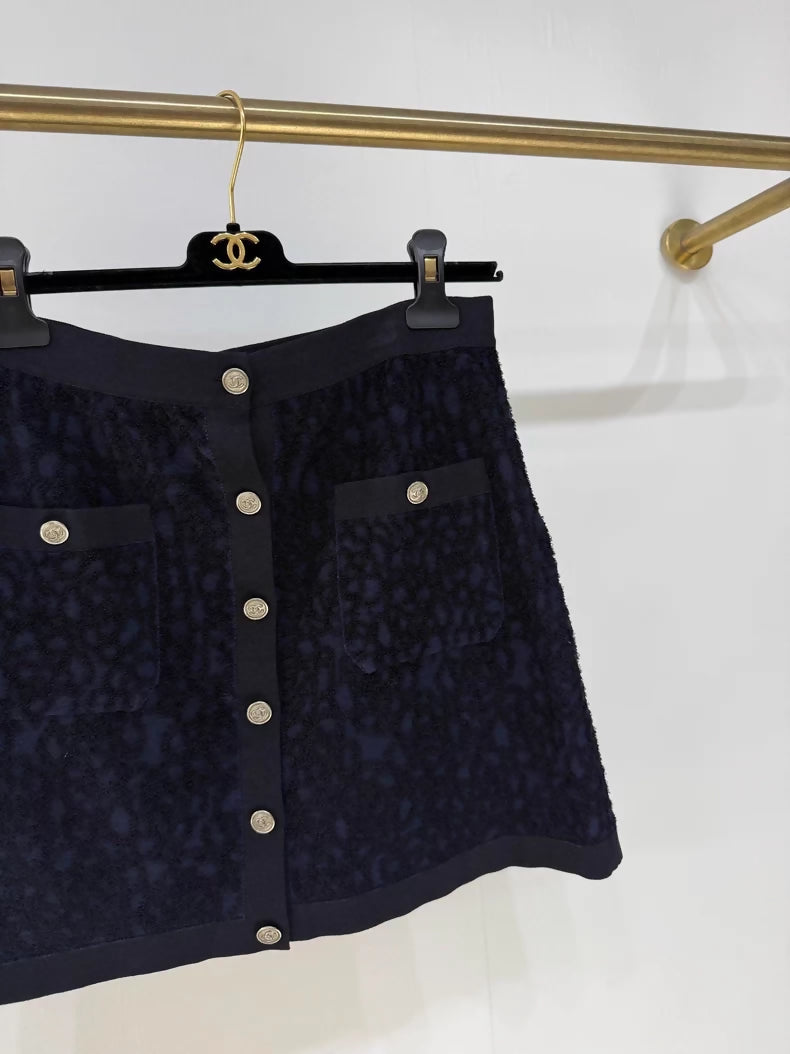 Chanel 21C camellia midi skirt,