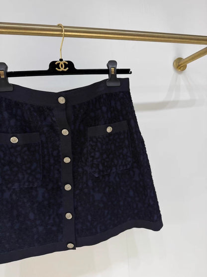 Chanel 21C camellia midi skirt,