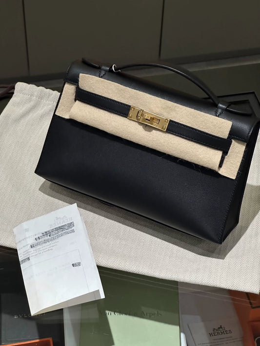 Hermes Kelly pochette Black Swift Leather with gold harwdare