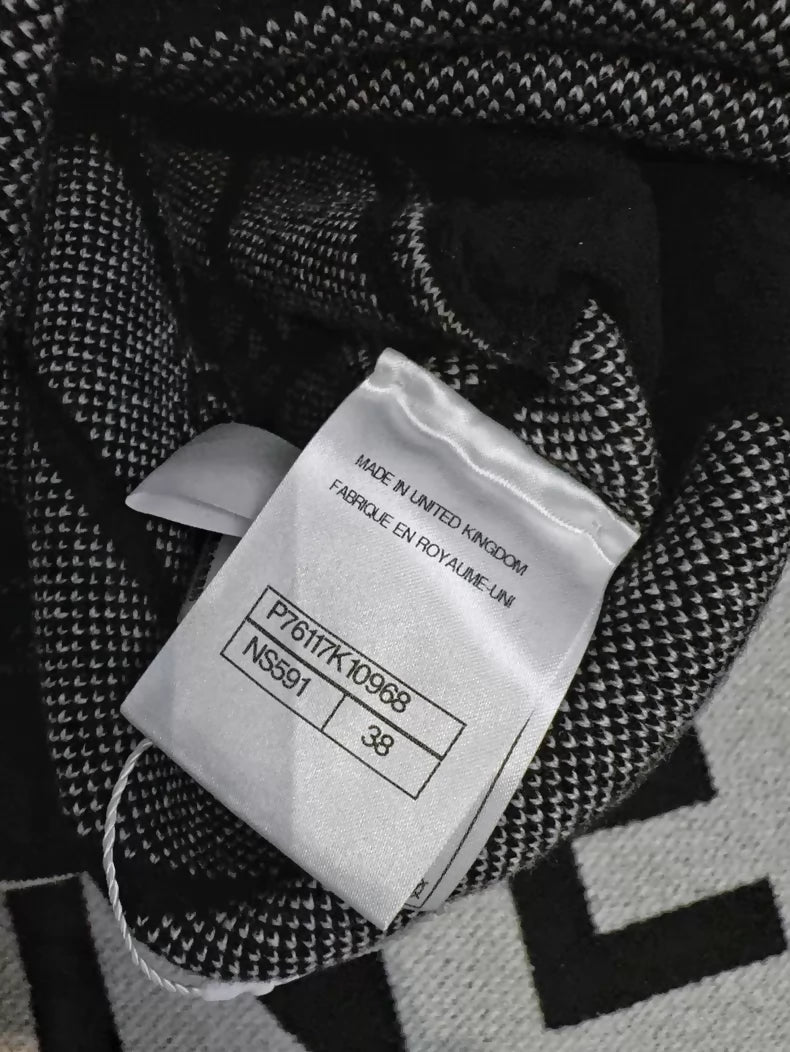 Chanel 23k black and white striped camellia double C logo knit shorts