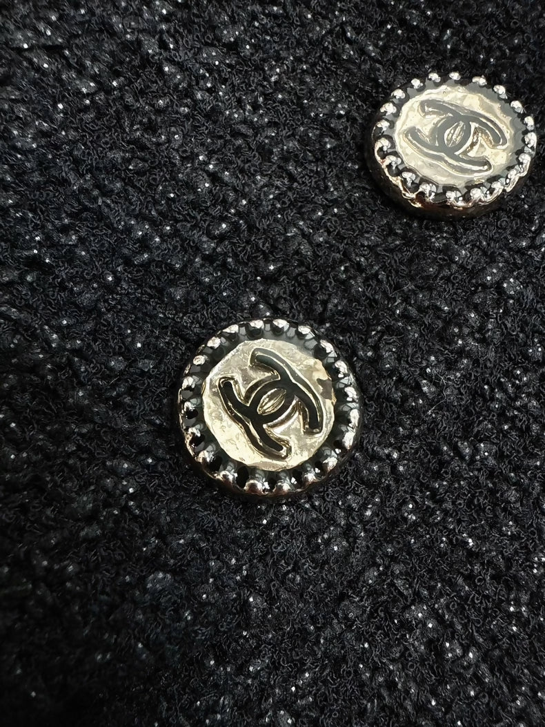 Chanel 22c black tweed jacket,